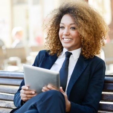 business woman tablet suit and tie