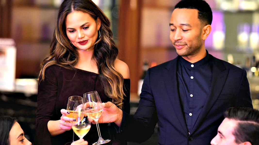Chrissy Teigen drinking