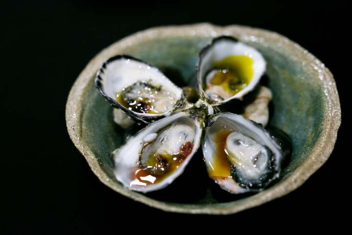Luxury Cuisine, Oysters with Sauce in blackground