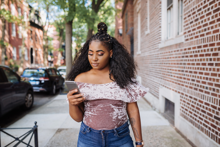 Body positive Afro-Caribbean Gen Z woman in New York