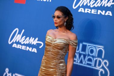 Tami Roman in a gold dress on theBET Presents: 2018 Soul Train Awards Red Carpet
