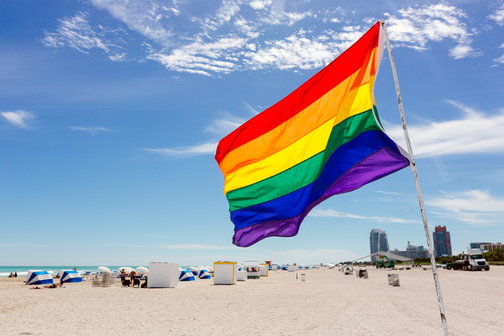 Rainbow flag on the beach in South Beach, Miami, USA