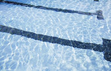 Heated swimming pool in health spa club. High angle view