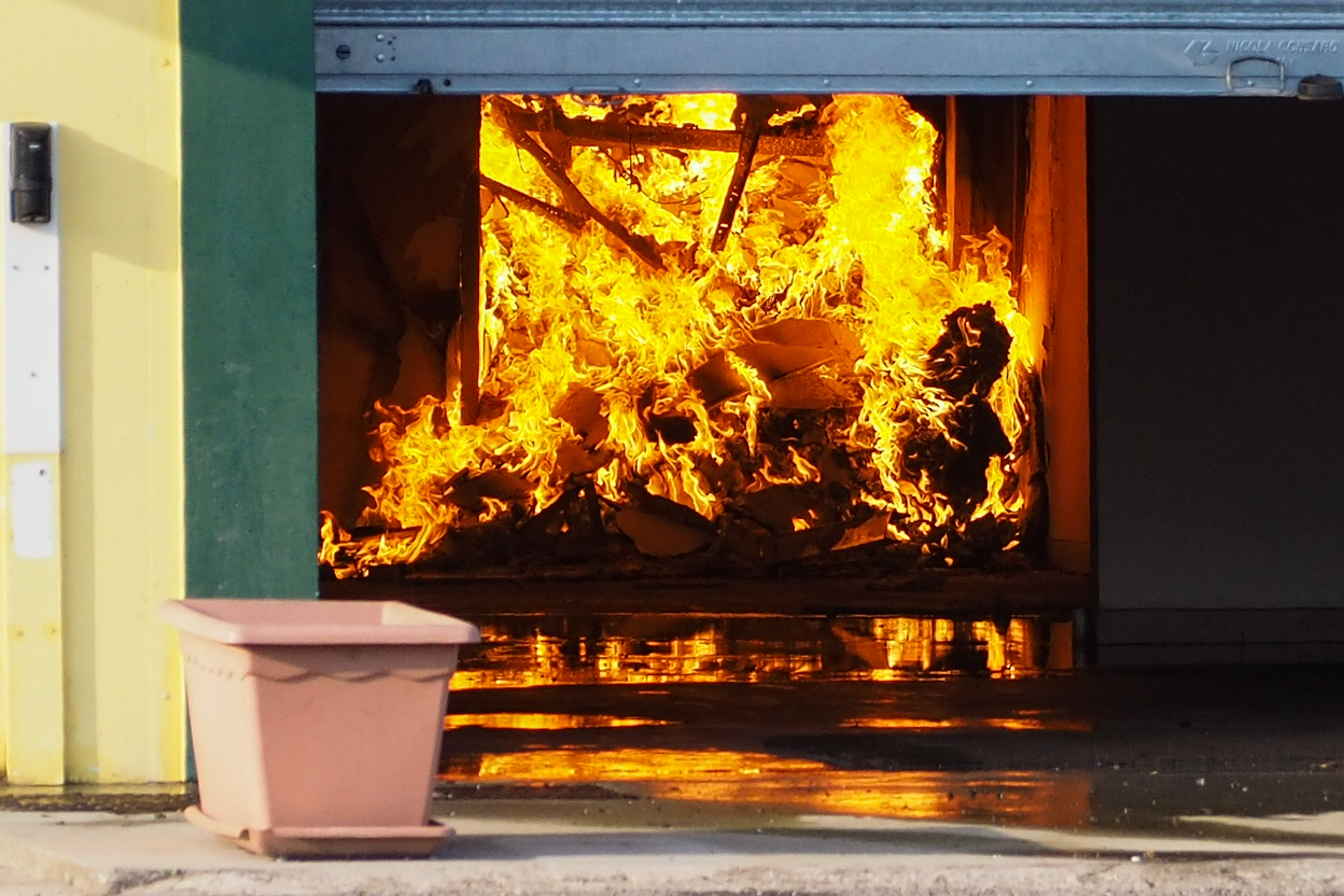 Firefighters respond to a large fire in an industrial building with a Cash and Carry containing with plastic, paper and foodstuff