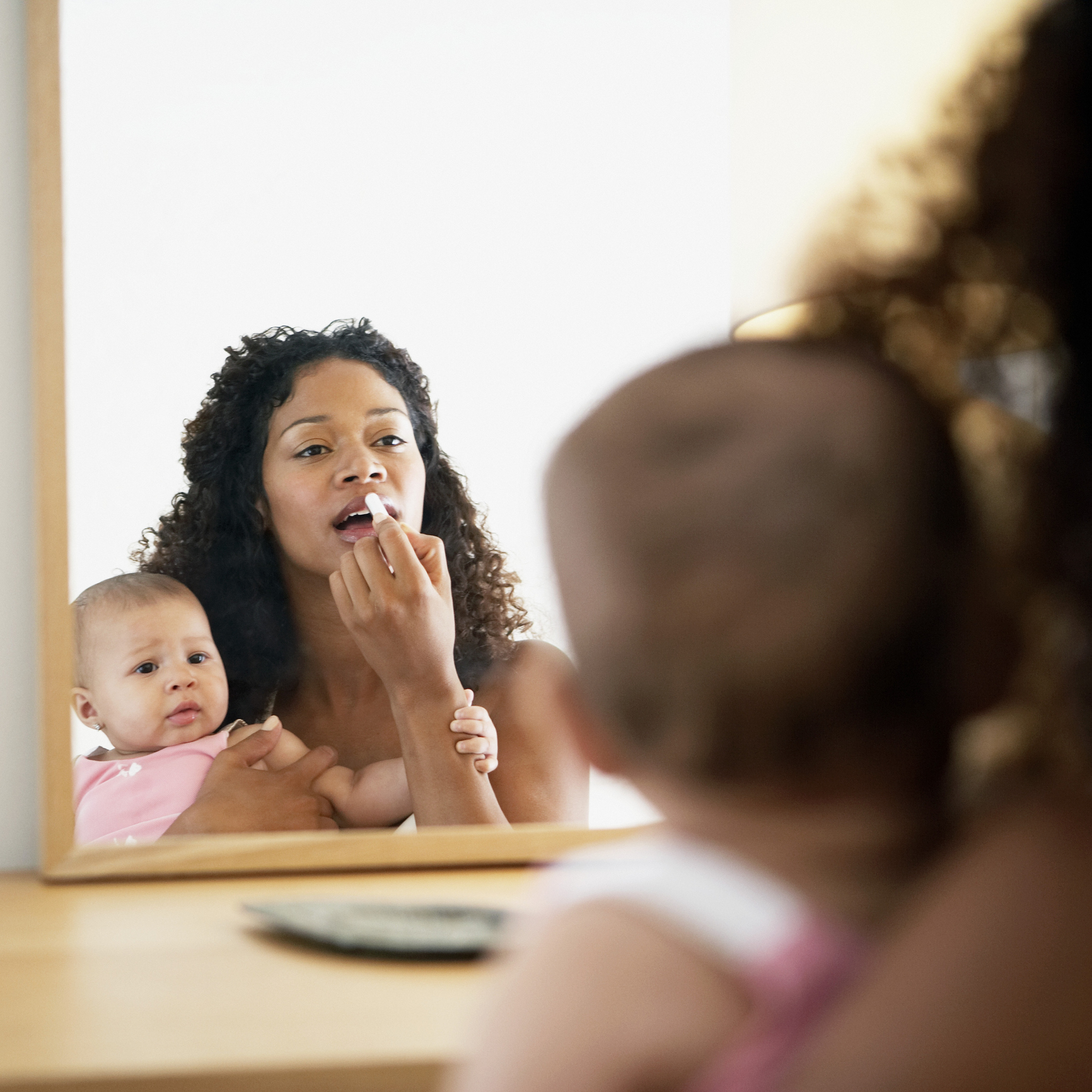 Mother Putting on Makeup