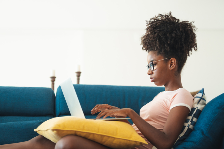 Studying with laptop on the couch