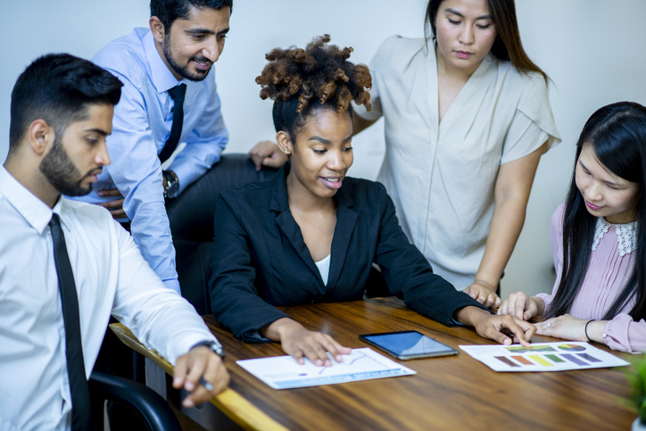 Diverse group of businesspeople at a conference table