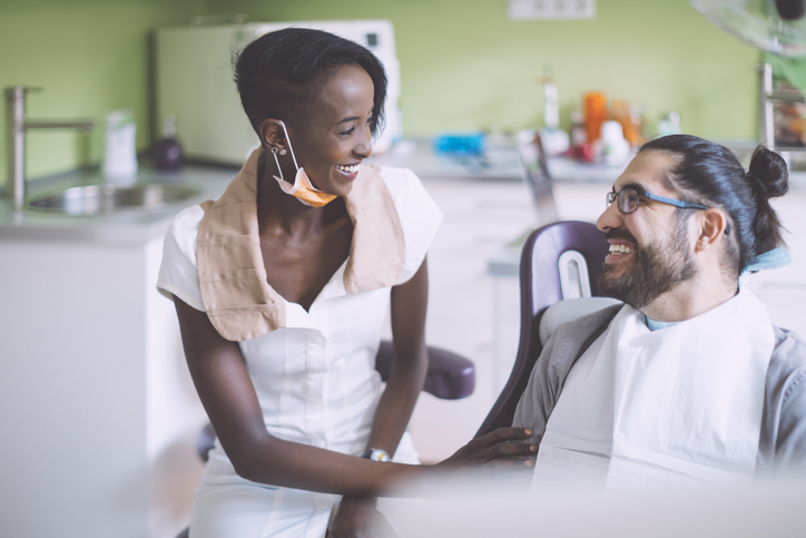 Patient is consulting with the dentist