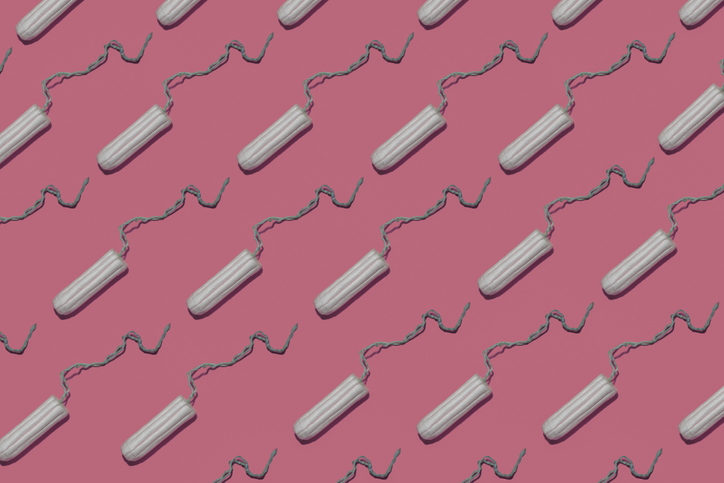 Tampons on pink background