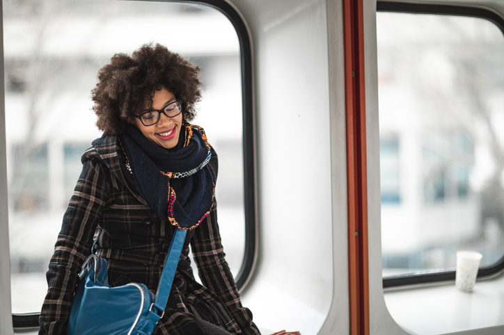 Beautiful young woman at the train station