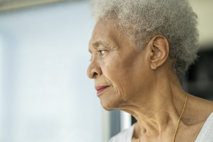 Senior woman contemplates
