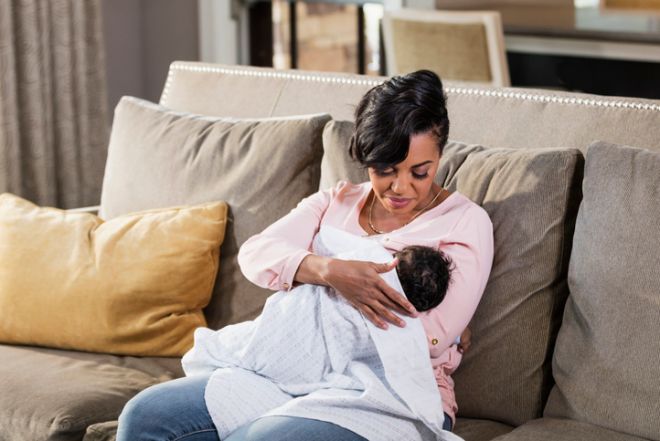 African-American mother nursing baby boy
