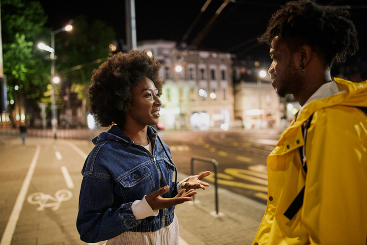 black woman hugging a friend