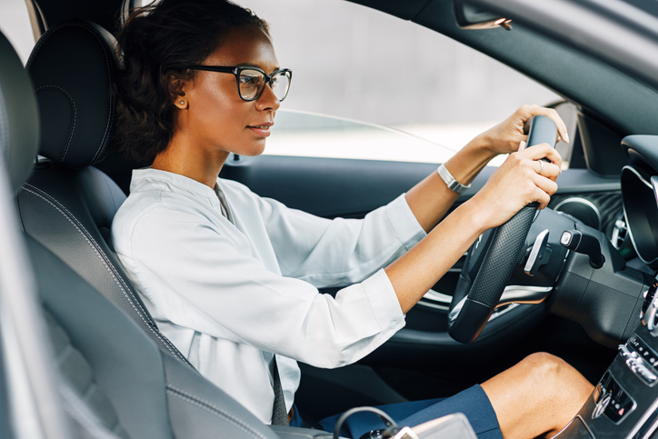 Young Woman Driving Car