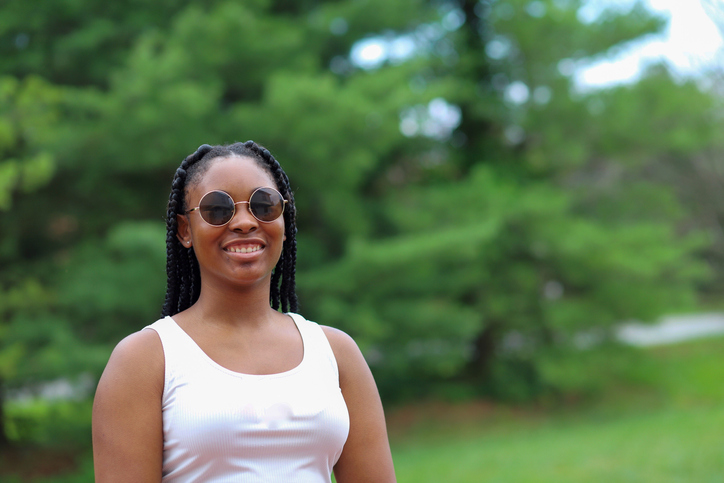 Portrait Of A Smiling Young Woman