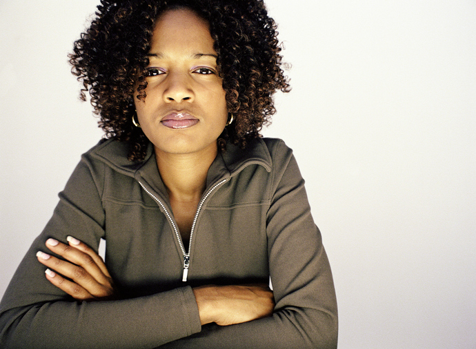 Woman with arms folded, portrait