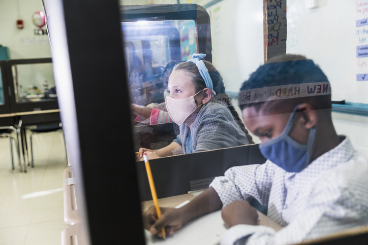 Elementary school students in class, covid-19 pandemic