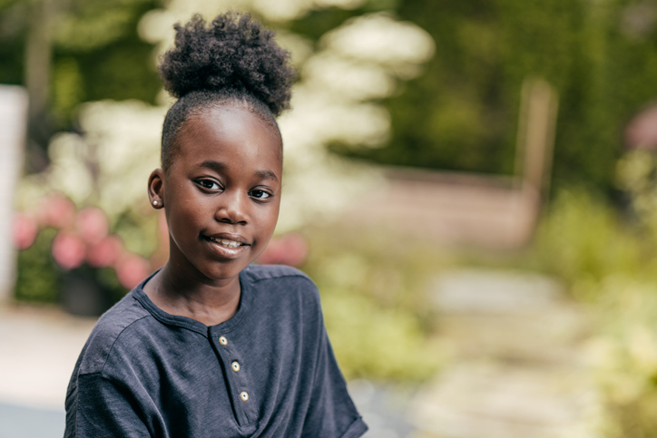Close up portrait of elementary age student girl