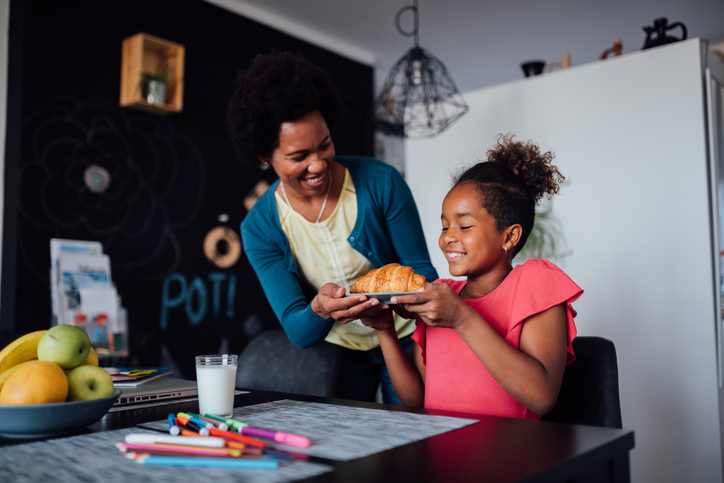 African American mother and daughter at home