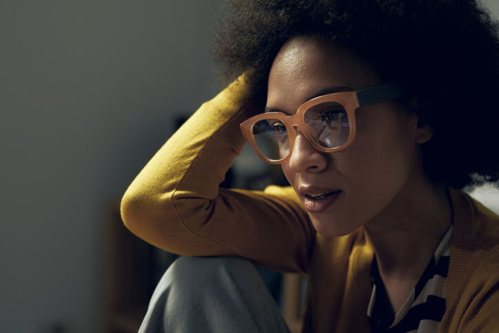 Close Up Portrait of a Beautiful Young Mixed Race Woman Wearing Yellow