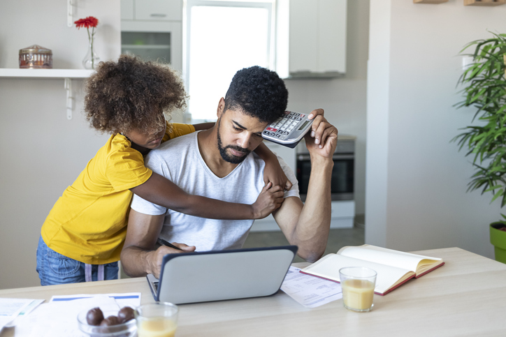 Worried Father working from home