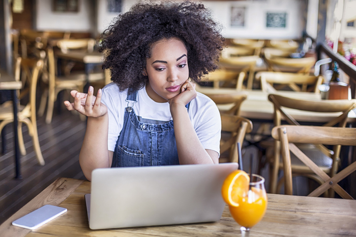 Woman having laptop problems
