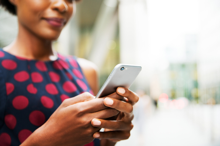 Close up of woman using smart phone