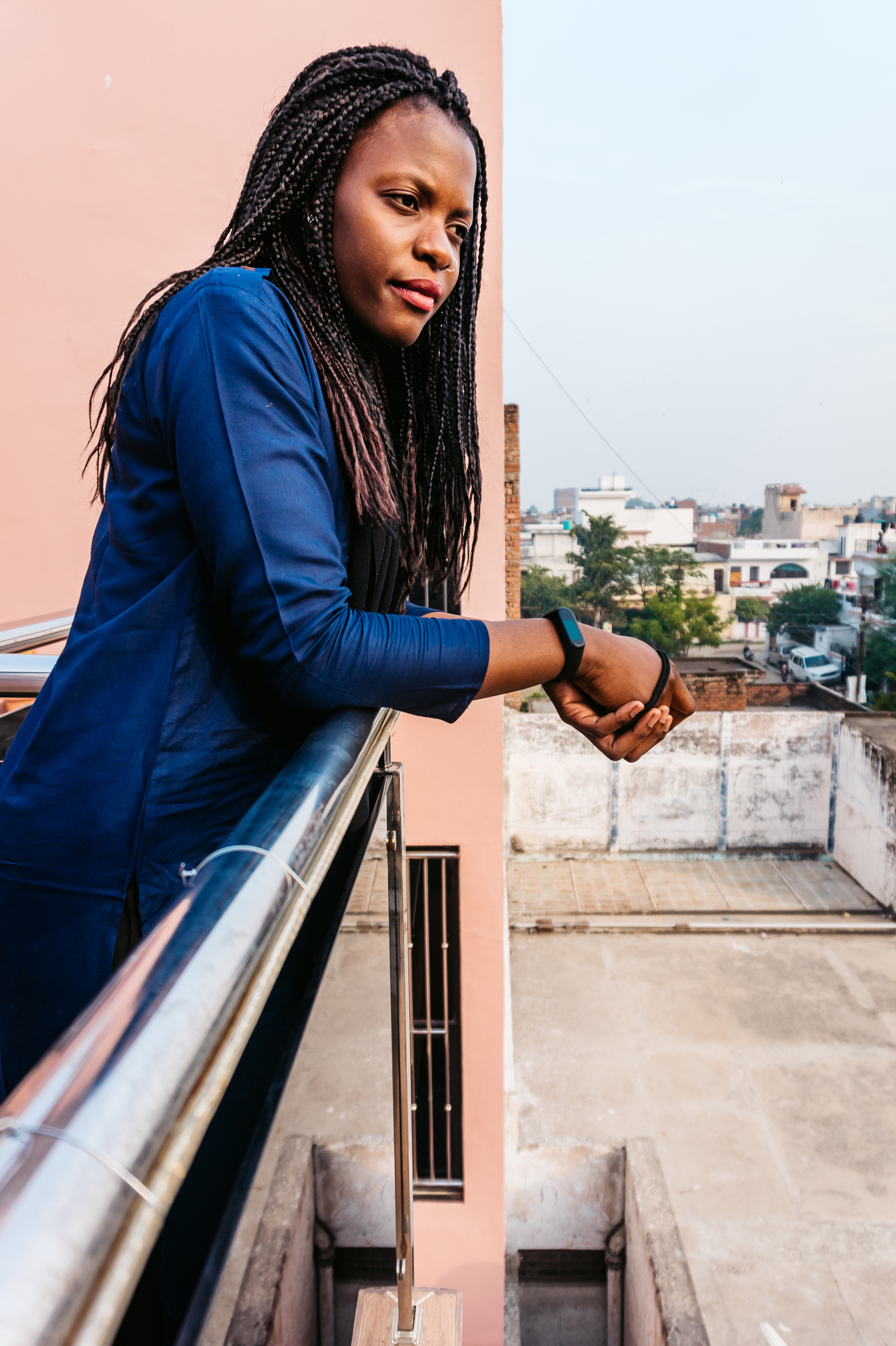 Sad woman contemplating on balcony