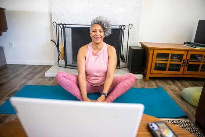 Beautiful Black Woman Doing Yoga at Home