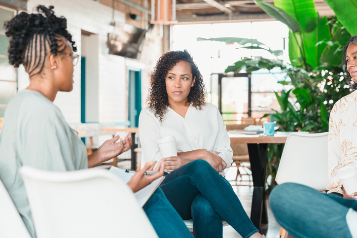 Woman participates in group therapy session