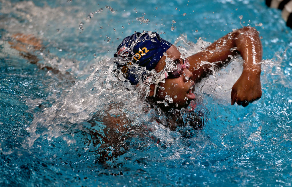 African American Kids Learn to Swim with Olympic Swimmer