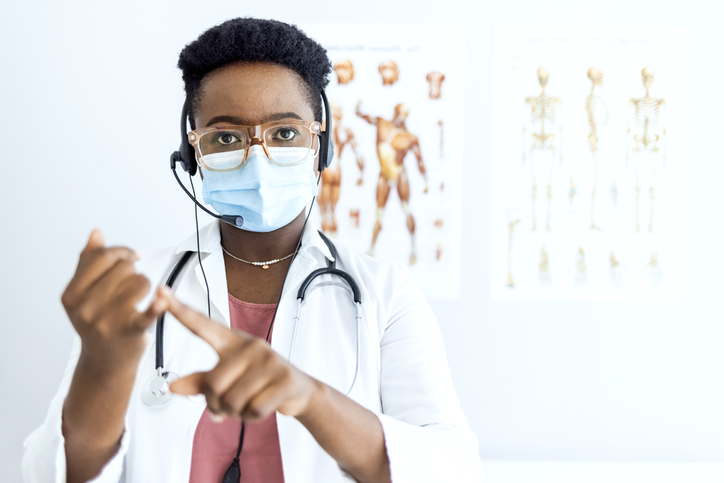 Doctor with headset ready for a video call