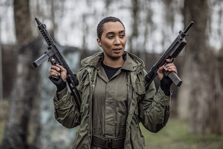 An individual military female during an outdoor operation