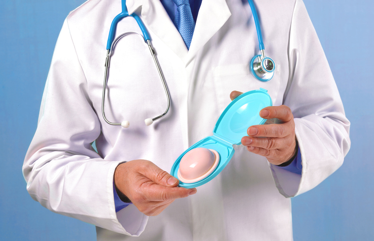 Doctor with diaphragm cap