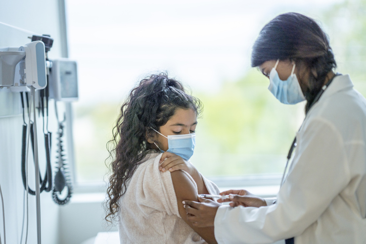 Young Girl Receiving a Vaccine
