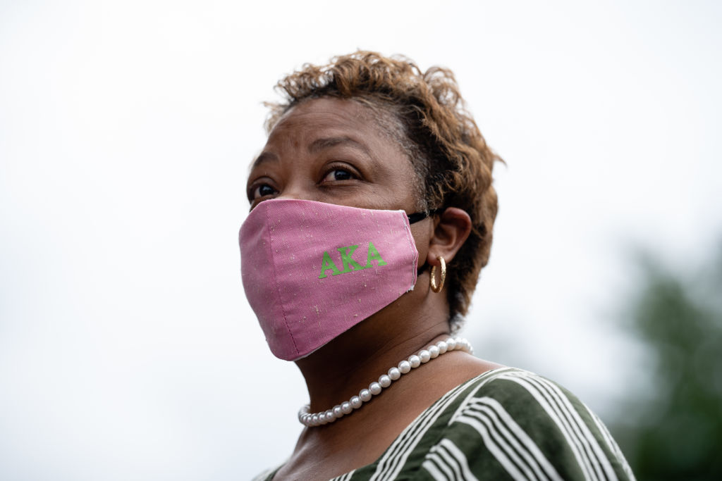 Supporters gather for Joe Biden and Kamala Harris as they appear at a news conference for the first time as the 2020 Democratic presidential ticket.