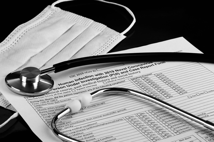 Doctors Stethoscope on COVID reporting form