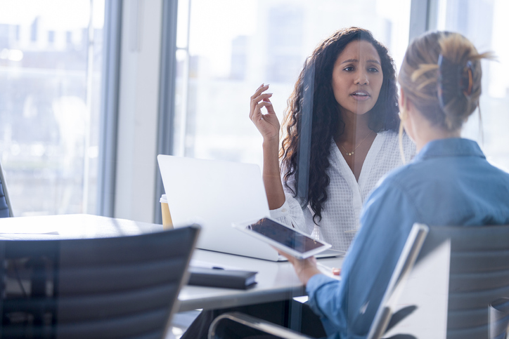 Business colleagues having a conversation.