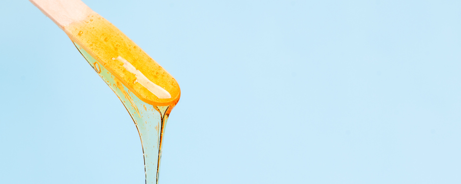Close-Up Of Liquid Against Blue Background
