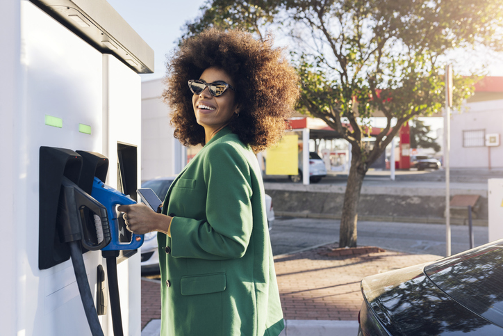 woman pumping gas