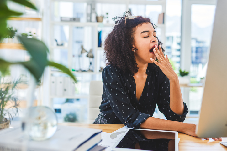 tired woman yawning