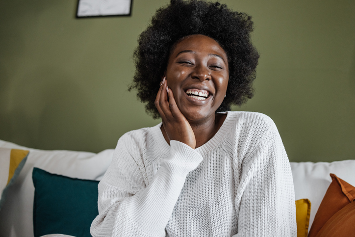 Portrait of a young African-American woman at home