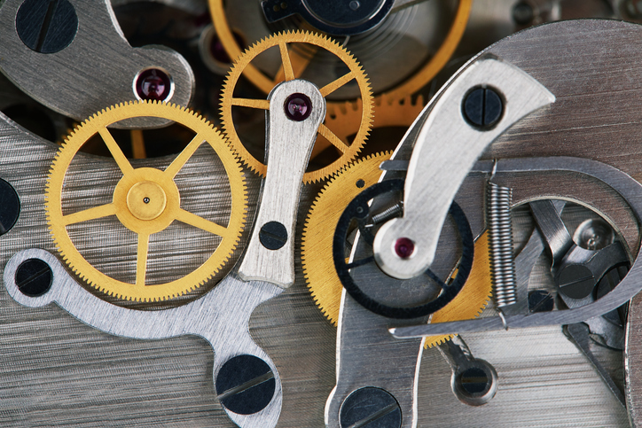 Clock mechanism with gears, close-up.
