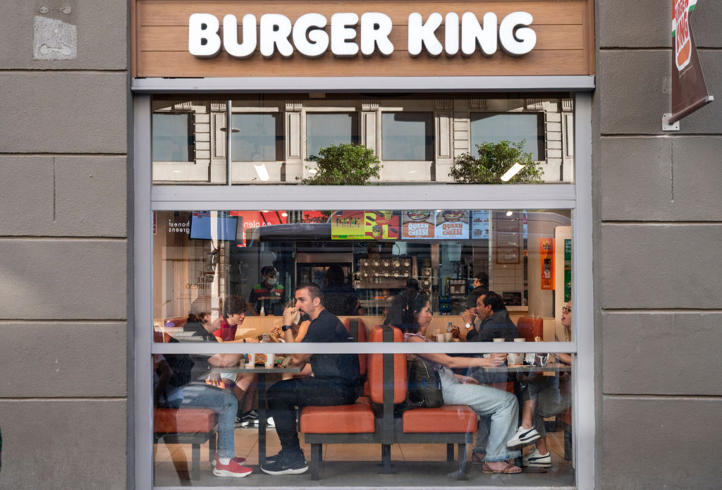 Customers are seen at the American chain of hamburger fast...