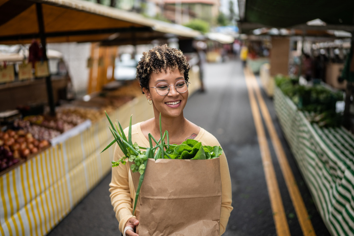 Young woman walking in one of the best cities for Black women