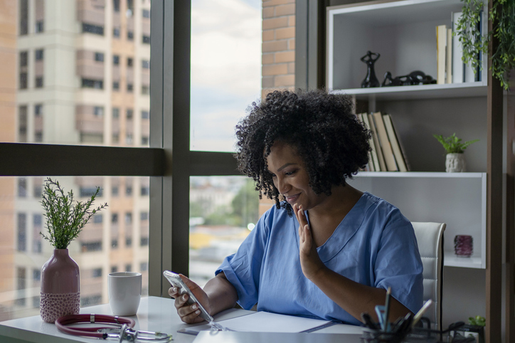 Nurse talking to patient in telemedicine video call