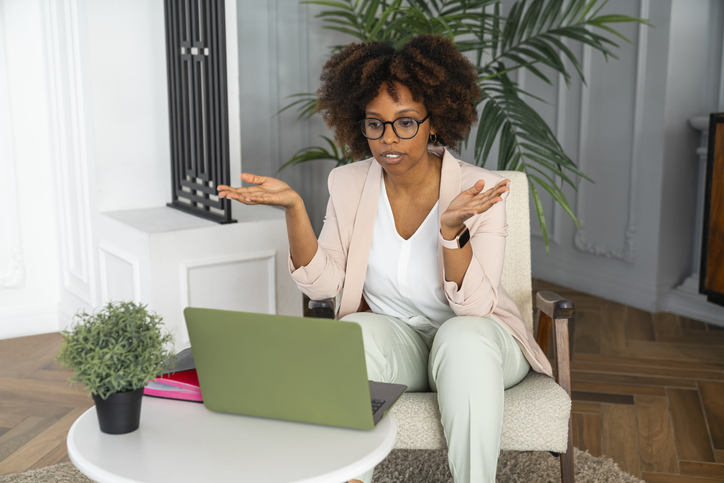Woman having online therapy session