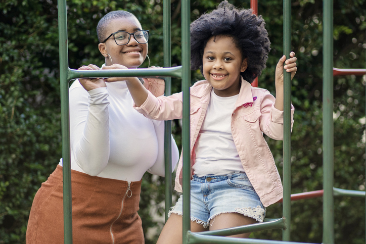 Sisters playing on the playground