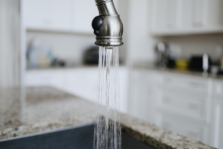 Water Flows From Kitchen Faucet