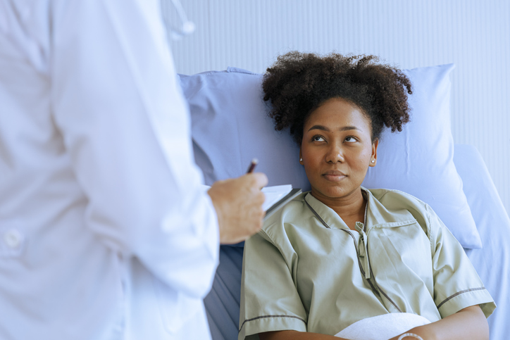 woman getting examed for ovarian cancer on teal talk day